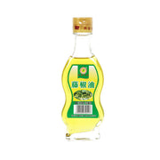 Pepper oil bottle with green-and-yellow label, capped glass bottle, 110 mL