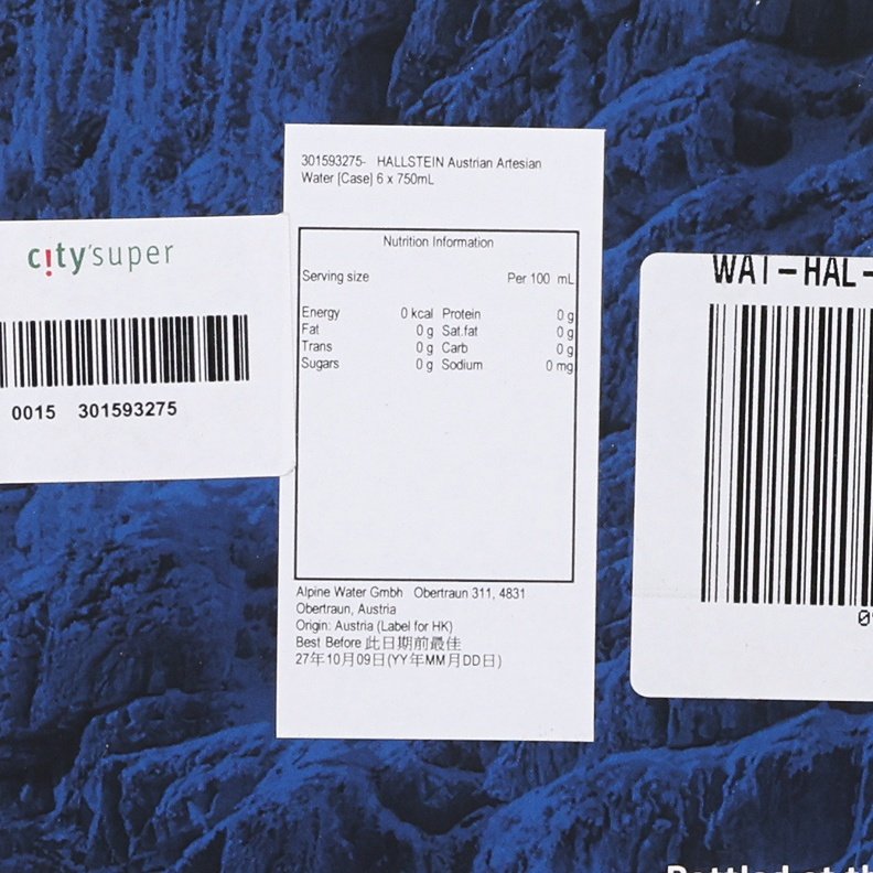 HALLSTEIN water label close-up showing nutrition information and barcode