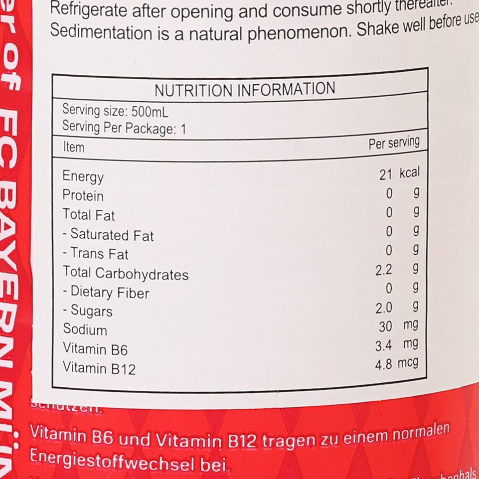 Nutrition information label close-up on red hydration drink bottle, serving size 500 ml