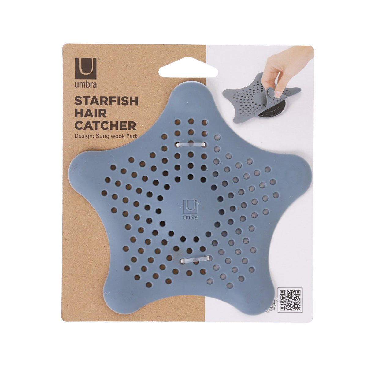 Starfish hair catcher in slate blue, silicone with perforations and suction base