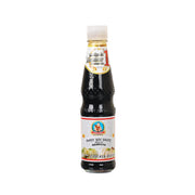 Sweet soy sauce bottle, dark sauce with front label and red cap band
