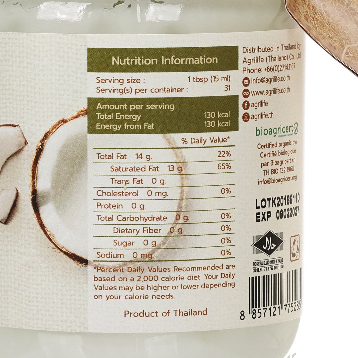 AGRILIFE organic extra virgin coconut oil nutrition label close-up on jar.