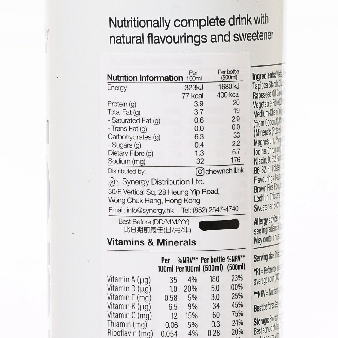 HUEL berry protein meal drink bottle, close-up nutrition information panel