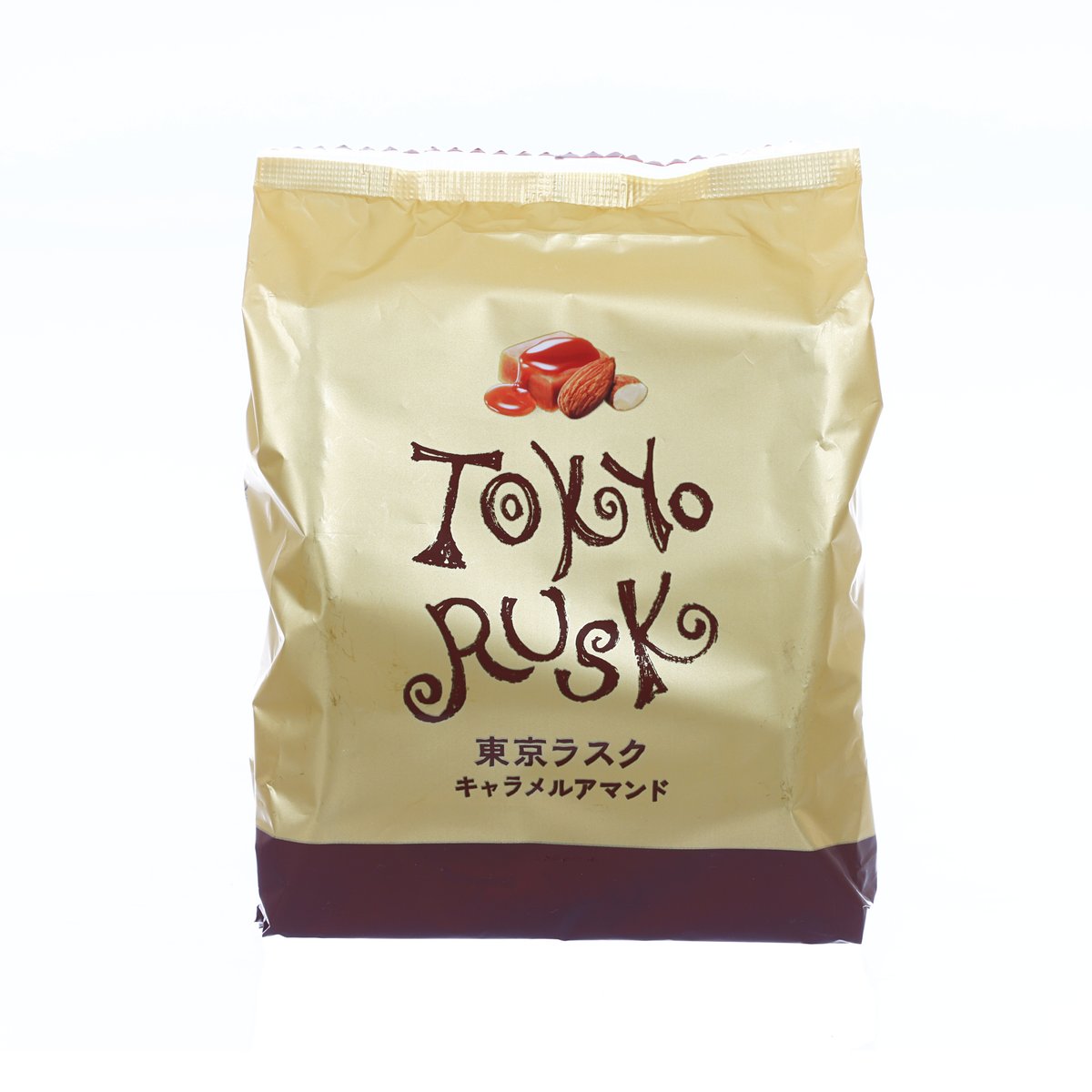 Caramel almond rusk bag with Tokyo Rusk logo on a golden wrapper