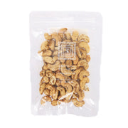 KINOKUNIYA pepper-seasoned cashew nuts in clear stand-up pouch, cashews visible