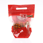 Red WING LOK spicy shrimp roe noodle pouch with handle cutout and shrimp graphic