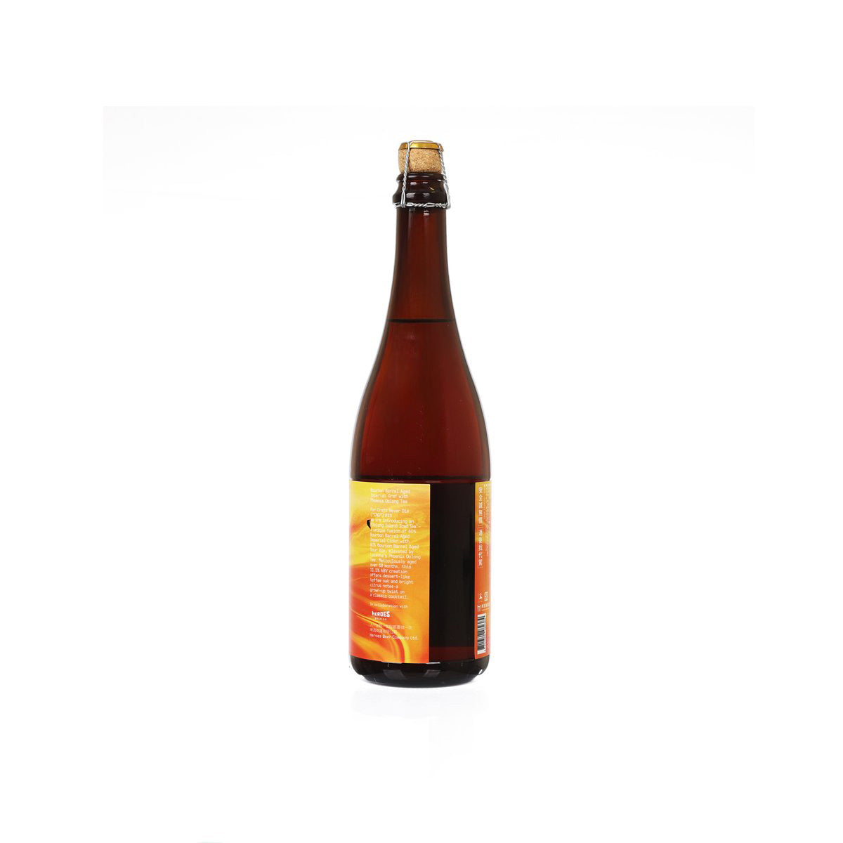 Brown beer bottle with gold foil cap and orange side label with dark barcode panel