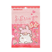 Peach gummy snack pouch with cute bunny and heart graphics