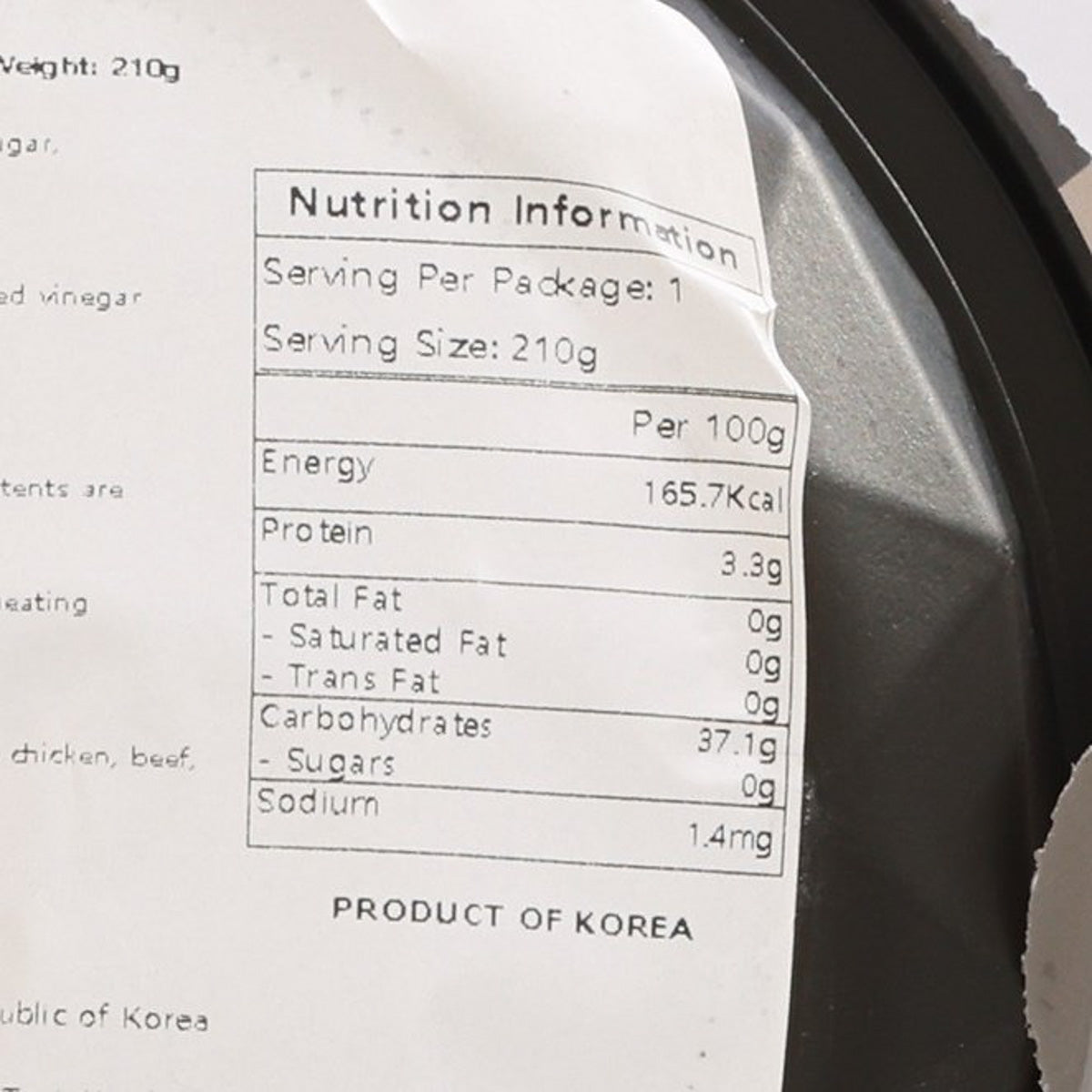 Nutrition information label on instant rice with collagen, serving size 210 g