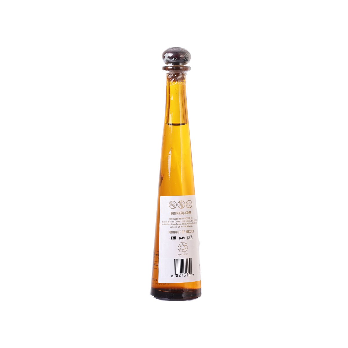 Tequila bottle, DON JULIO 1942, amber liquid with white back label