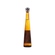 Tequila bottle, DON JULIO 1942, amber liquid with dark front label