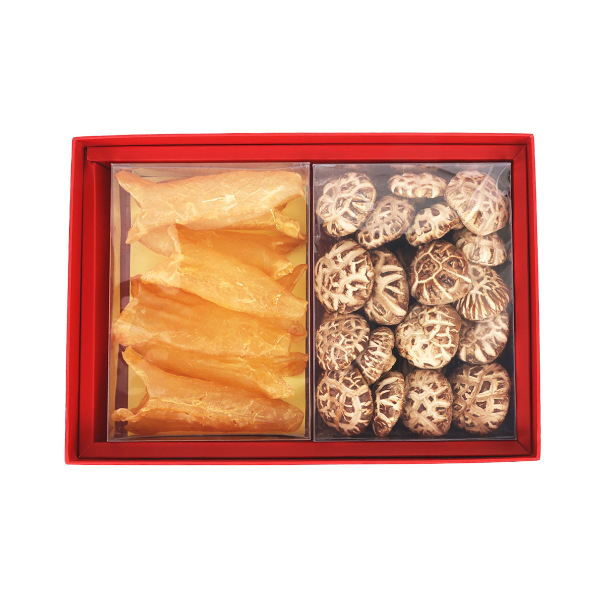 Open gift box with dried shiitake mushrooms and dried fish maw strips in compartments