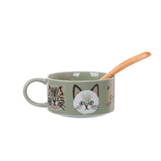 Sage green ceramic soup mug with cat faces and wooden spoon handle