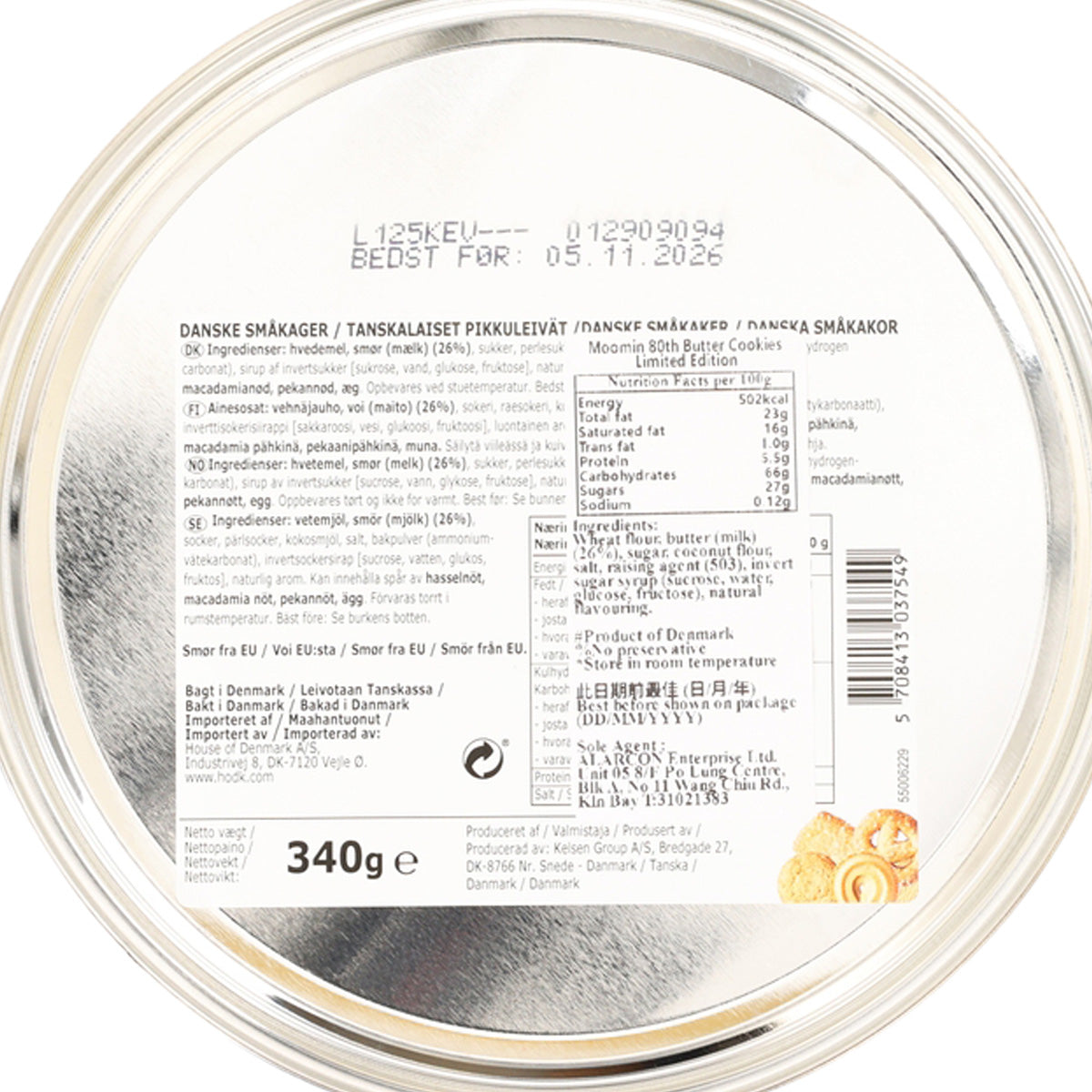 Close-up of silver biscuit tin label with ingredients and 340g net weight