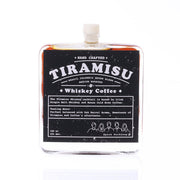 Tiramisu whiskey coffee liqueur bottle, clear glass with front label and white cap