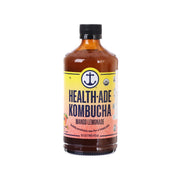 HEALTH ADE kombucha bottle, Mango Lemonade flavor, dark amber liquid, black cap