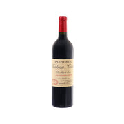 Wine bottle with dark glass and red cap, label on front