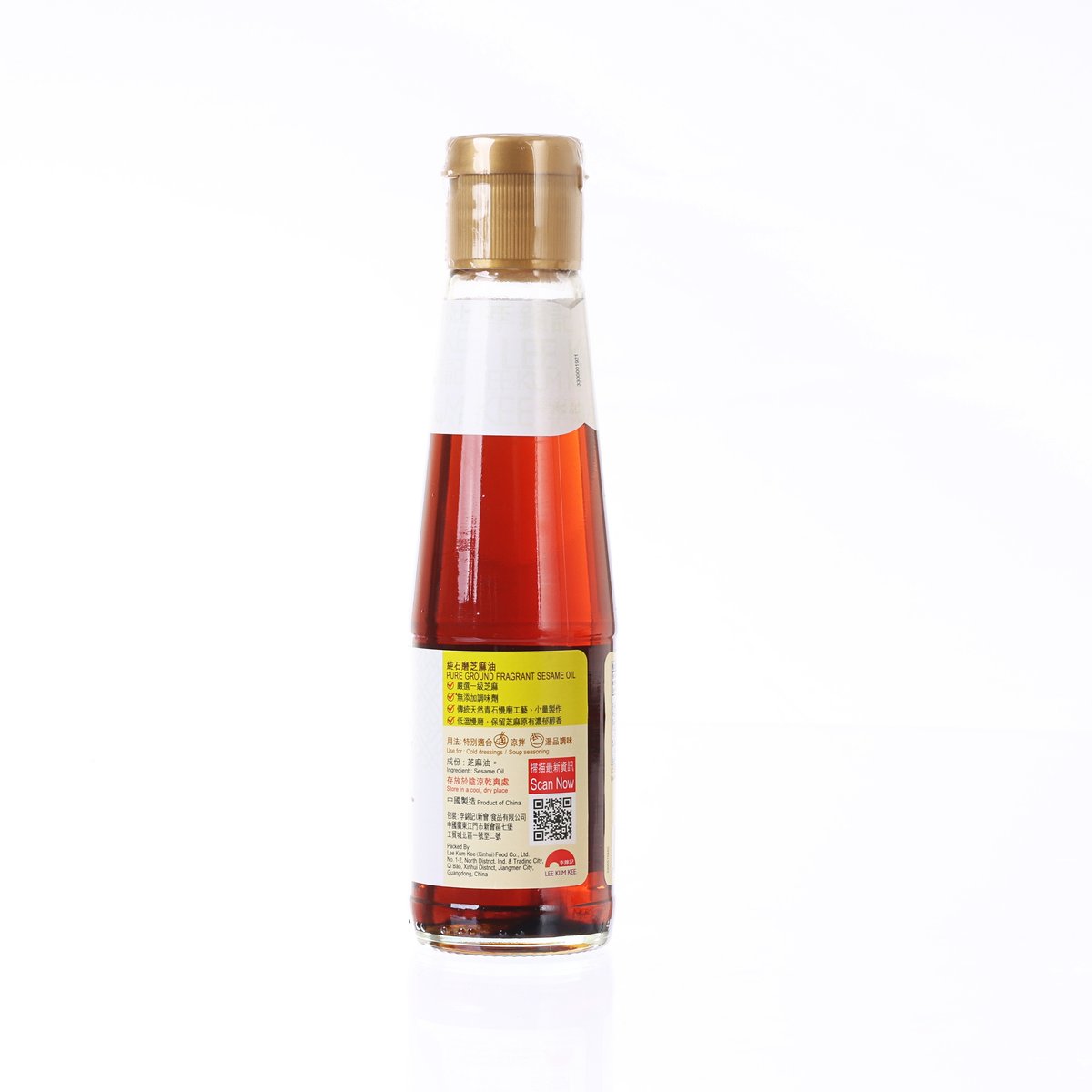 LEE KUM KEE fragrant sesame oil bottle with gold cap and back label, red liquid