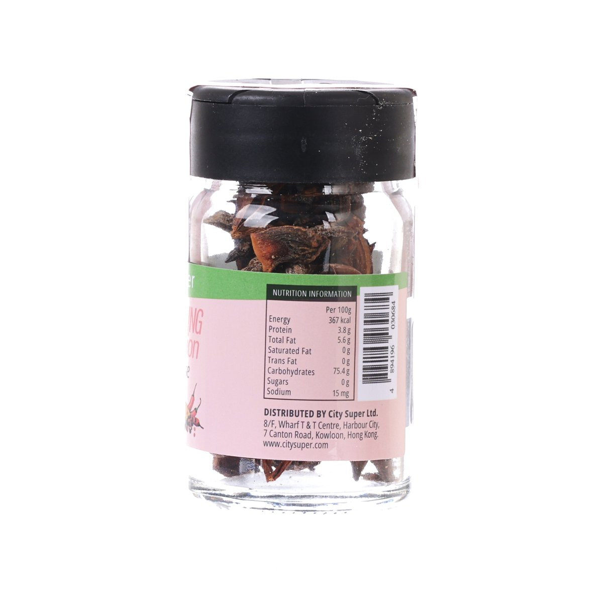 Star anise seasoning bottle with nutrition panel label and whole pods inside