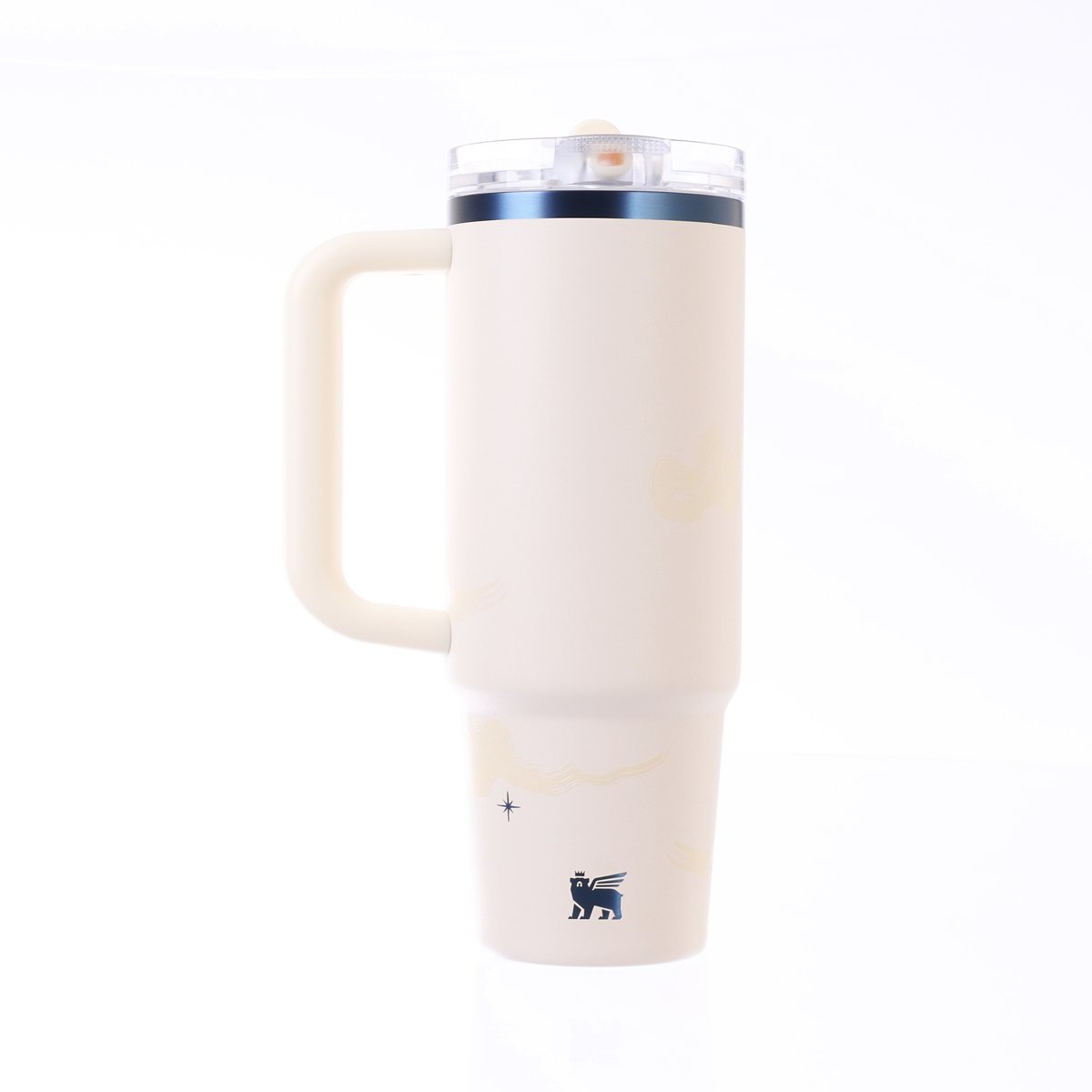 Cream STANLEY tumbler with clear flip-straw lid and front logo patch