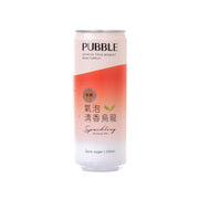 Zero-sugar sparkling oolong tea can with orange gradient label and leaf icon