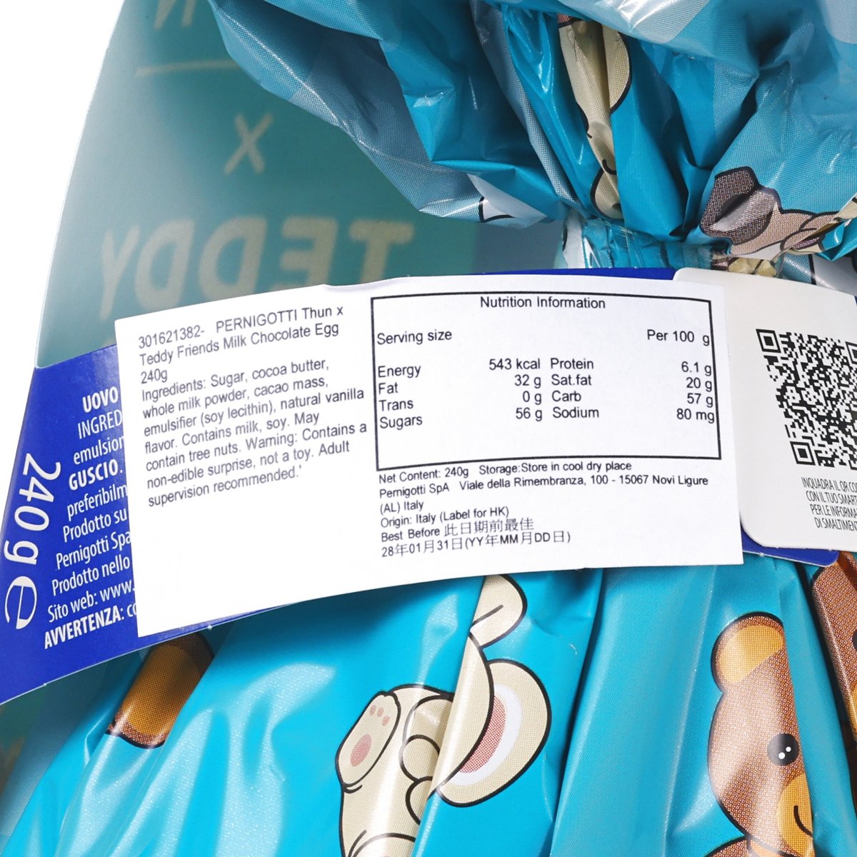 Nutrition label and QR code on blue wrapper of milk chocolate egg, PERNIGOTTI.