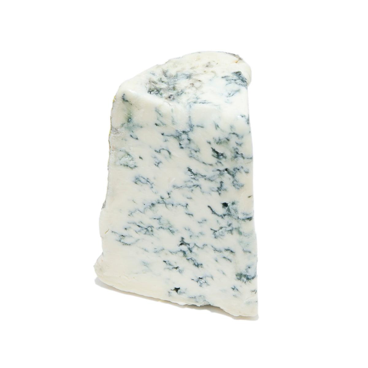 Fourme d'Ambert blue cheese wedge, pale white with blue veining