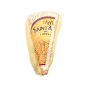 Full fat soft cheese wedge with pale rind and visible label