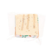 RAMBOL processed cheese loaf, pale cream with visible walnut pieces in a clear pack