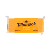 TILLAMOOK medium cheddar cheese block, 227g, in clear plastic wrapping