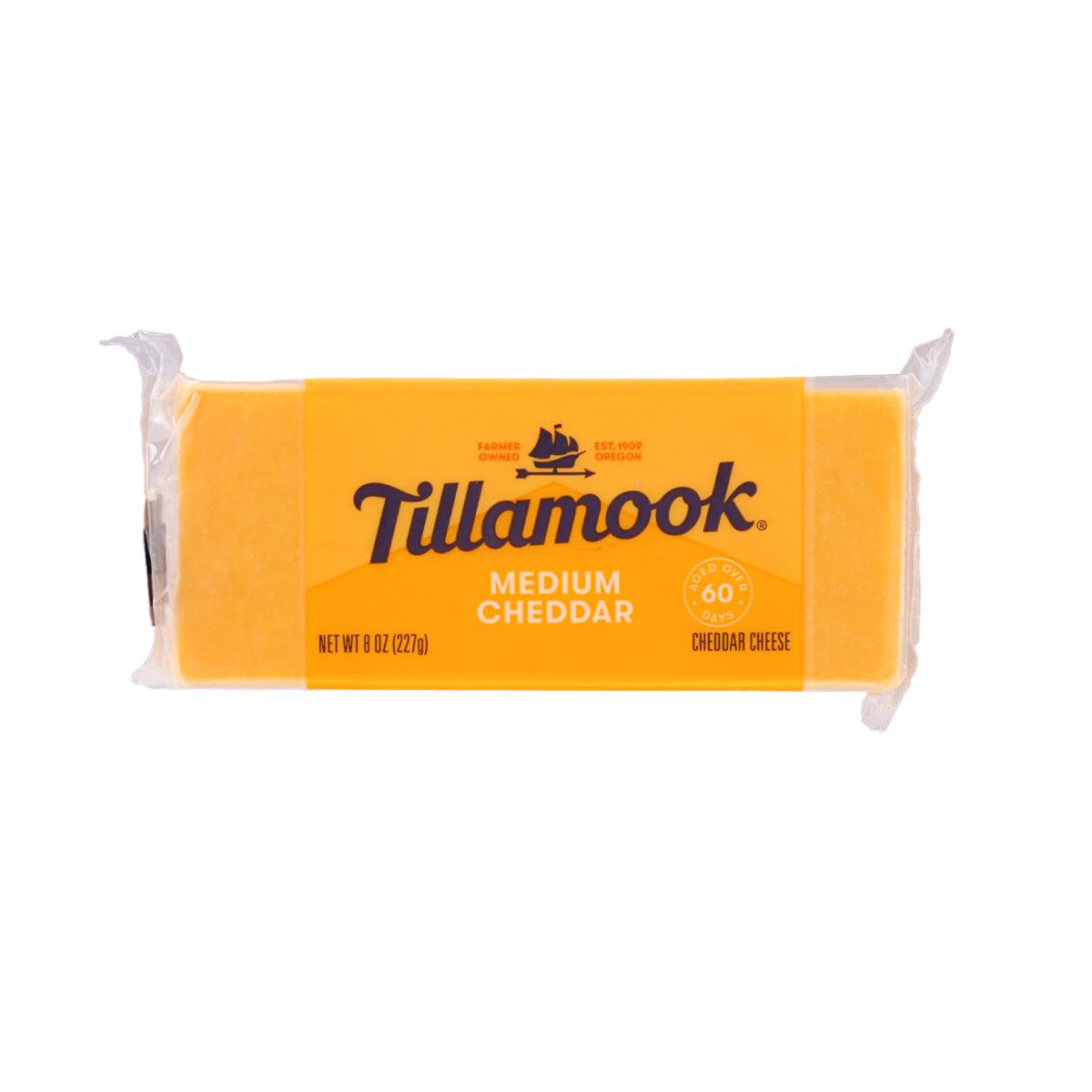 TILLAMOOK medium cheddar cheese block, 227g, in clear plastic wrapping
