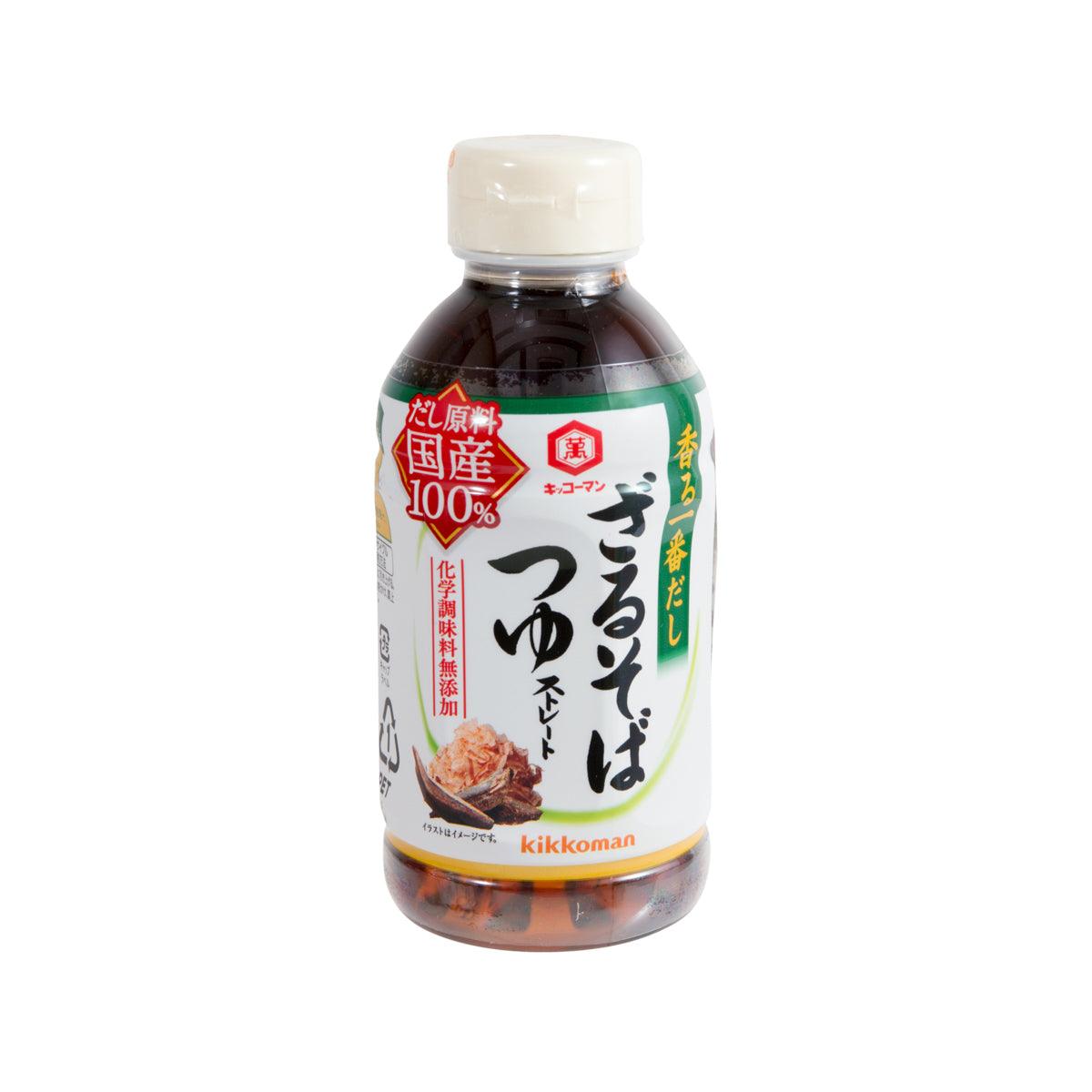 KIKKOMAN cold soba soup base bottle with dark brown liquid and white cap
