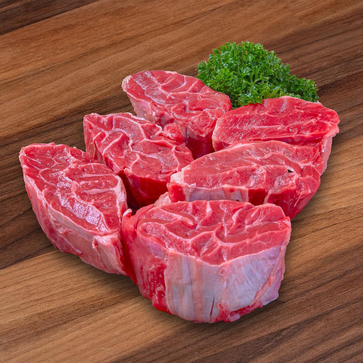 Chilled beef shin meat cuts with visible white fat