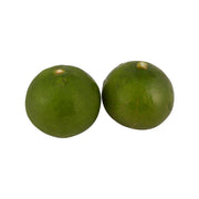 Thai limes, two small green citrus fruits
