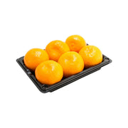 Pack of orange mikan mandarins on a black plastic tray