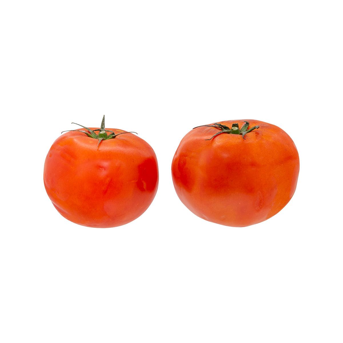 Dutch beefsteak tomatoes, two whole red tomatoes with green stems