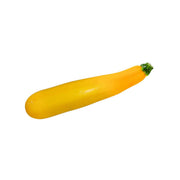Yellow zucchini squash with green stem, whole vegetable