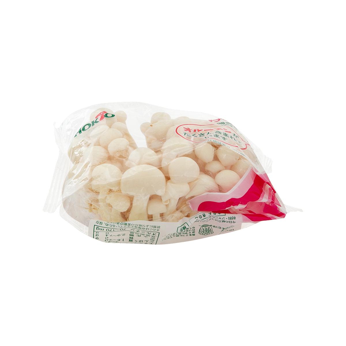 Packaged white bunapi shimeji mushrooms, 100 g bag with side label