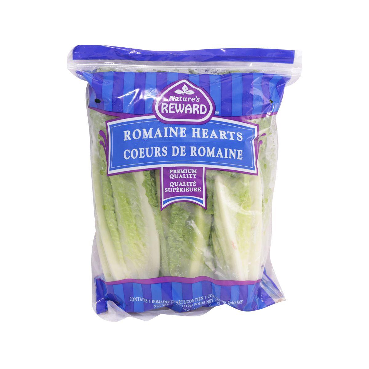 Packaged romaine heart lettuce in clear bag, green leaves with white ribs