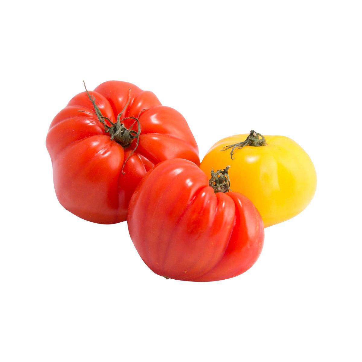 Fresh red and yellow tomatoes with green stems