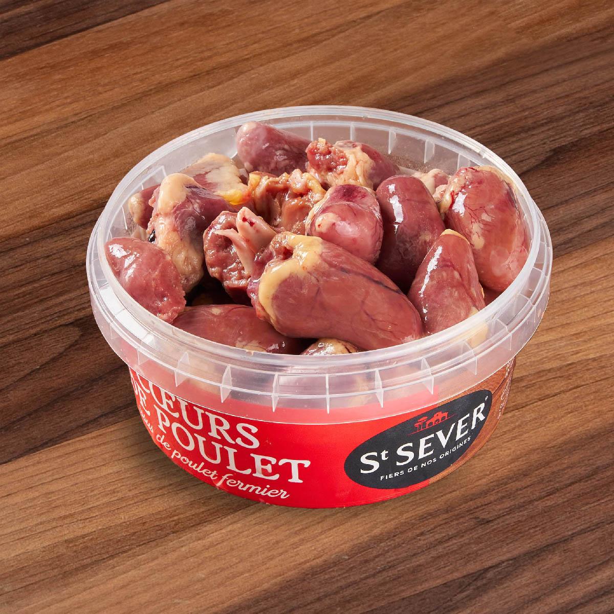 Chilled chicken hearts in clear plastic tub