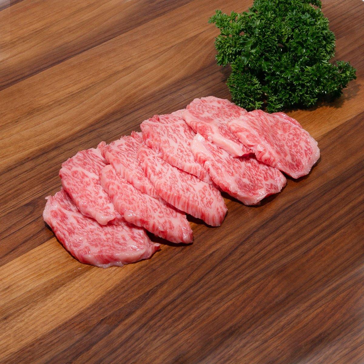 A5 wagyu beef yakiniku slices, pink with fine marbling