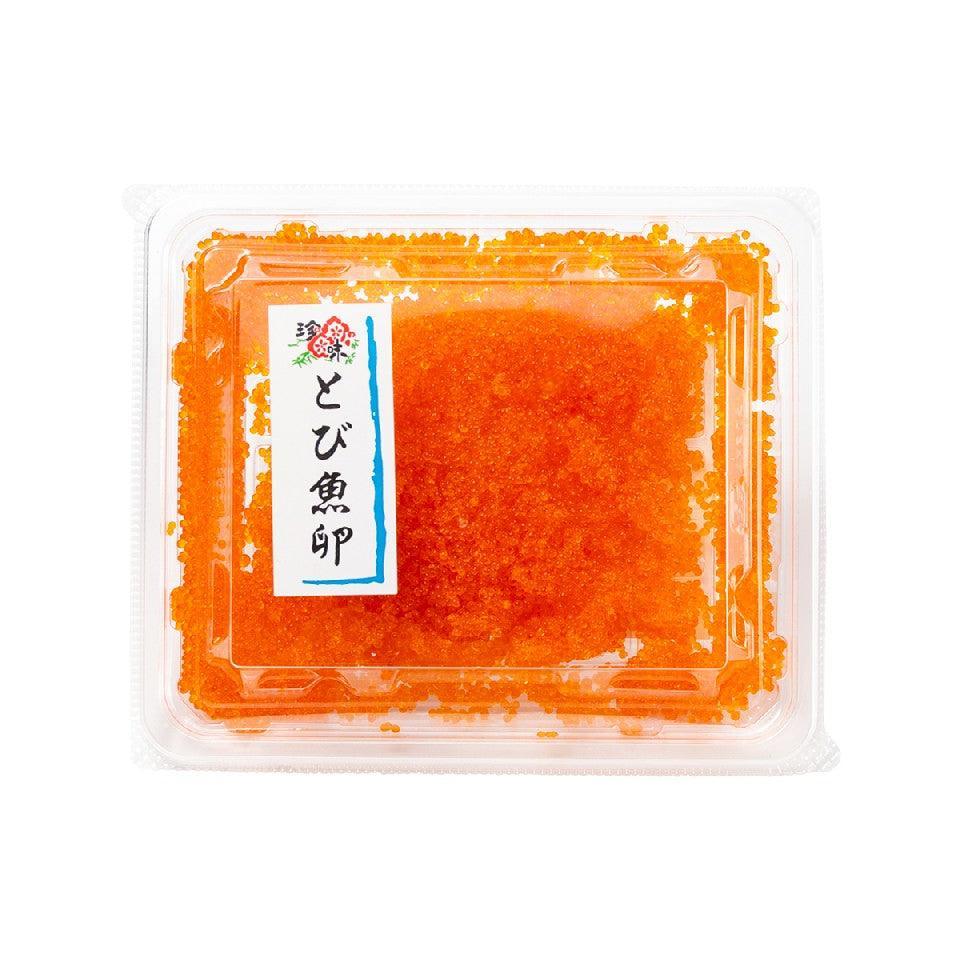 Flying fish roe in clear plastic tray with front label, bright orange roe