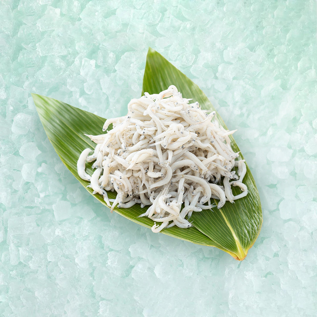 Dried whitebait heap in a green banana leaf