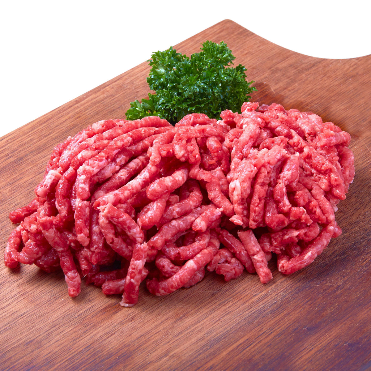Organic minced beef, red ground meat pile on a wooden cutting board