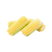 Sweet corn on the cob, sliced into yellow segments