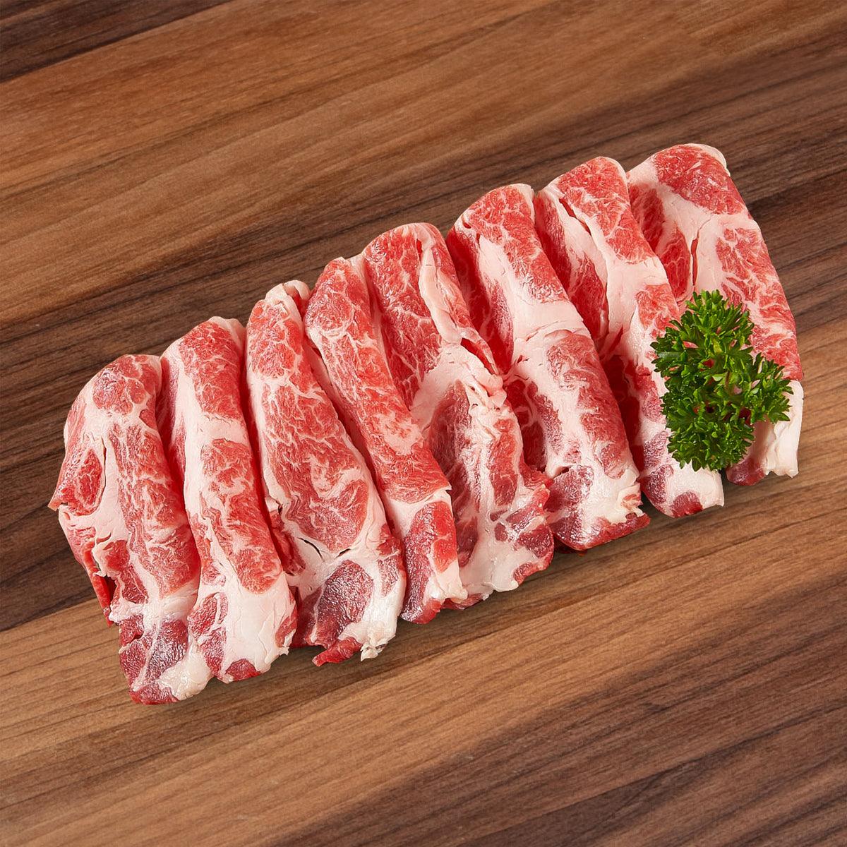 Marbled red-and-white Iberico pork sukiyaki slices, neatly fanned