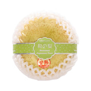 Seasonal Japanese pear-flavored dessert in a clear white net wrap