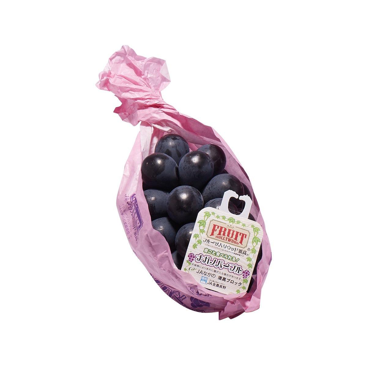 Bag of Japanese seedless purple grapes with dark purple grape clusters