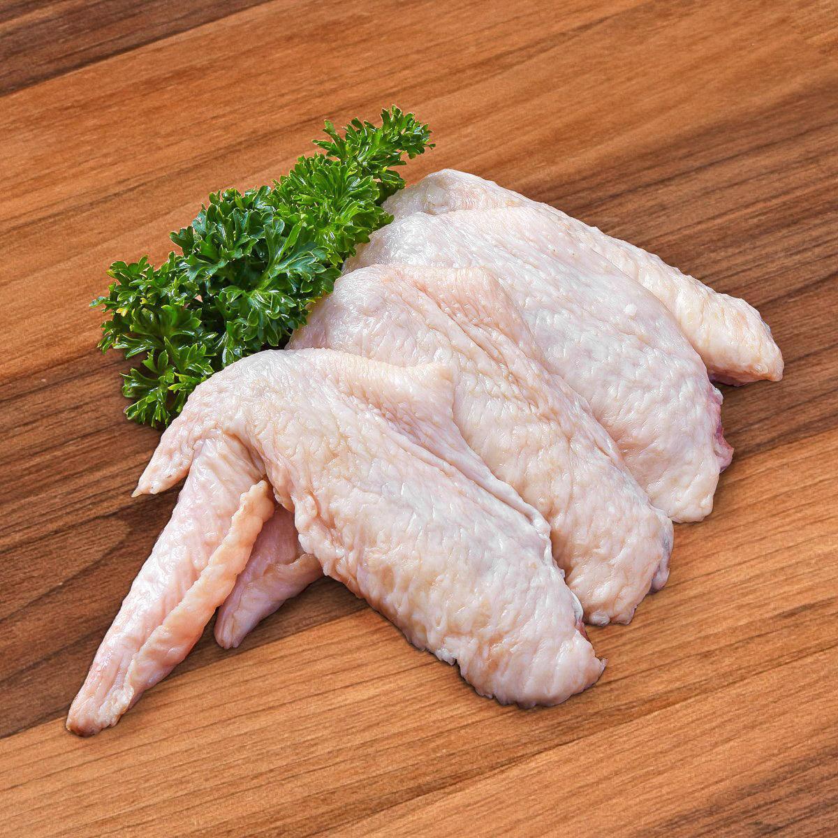 SANWACORPO frozen chicken wing portions with tips, pale skin; small parsley garnish